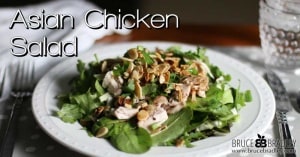 Bruce Bradley's Asian Chicken Salad is a delicious blend of salad greens, cilantro, green onions, chicken, and almonds—all with a dressing that really makes this salad pop!
