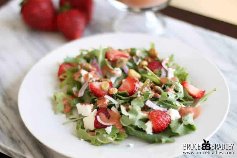 Serve Up A Delicious Helping Of Spring Or Summer With This Strawberry Salad With Goat Cheese, Pistachios, And A Creamy Strawberry Balsamic Vinaigrette!