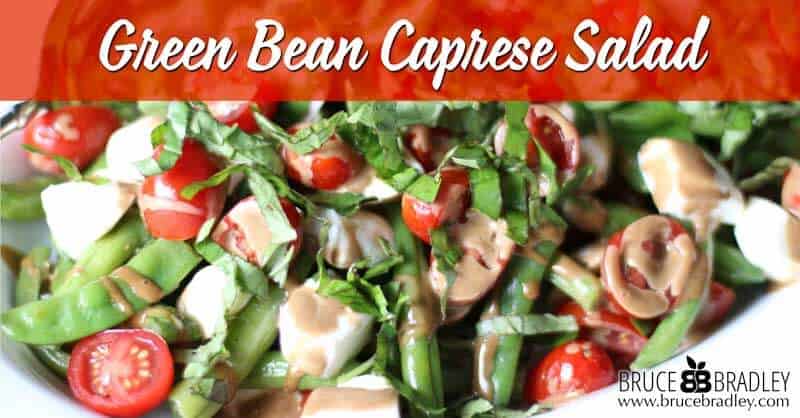 Green Bean Caprese Salad is a fantastic hot or cold salad made with green beans, tomatoes, fresh mozzarella, basil, and a creamy balsamic vinaigrette!